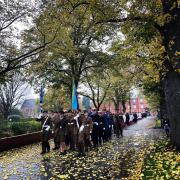 Shrewsbury School's Combined Cadet Force marching towards Sir Phillip Sydney War Memorial