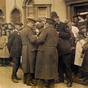 SIGNING UP: Recruitment taking place in front of Tudor House in Chaddesley Corbett in 1914.