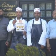 Owner Jomir Uddin, right, and members of the Jaipur Cottage team celebrate their Worcestershire Regulatory Services award