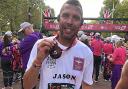 Jason Connon with his medal after completing the 2022 London Marathon
