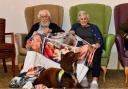 Oriel Care Home residents, Toni and Len Browning, pictured with therapy dog Sprocker Spaniel Lester