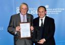 Rob Chadwick, director of The ContinU Trust, right, receiving the community champion award from West Mercia Police and Crime Commissioner Bill Longmore
