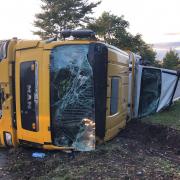 The cab ended up on its side after the vehicle careered into the central reservation on the A491