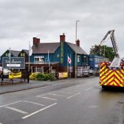 Firefighters battle a blaze at The New Wellington pub on Brettell Lane.
