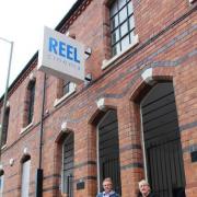 James Anderson Brown, Anthony Hughes and Eddy Morton outside the old Reel cinema which has been renamed the Lume Cinema