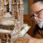 Terry Hartill with a giant gingerbread Hogwarts that he made