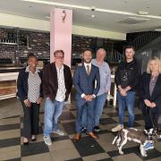 Suzanne Webb MP, right, with Diana Boateng, James Anderson Brown, Sam Binks, Dave Shuck, and Ryemarket centre manager Aaron Powell in the former Chicago's unit which is to become a cinema.
