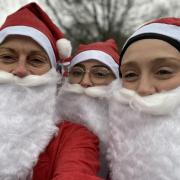 Heather Hyde, left, with her niece Leah Marsh, centre, and daughter Alex Slater, right, at The Mary Stevens Hospice Santa Jog