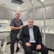 Dr Paul Worskett (left) pictured with joint managing director of John Truslove Ian Parker (right) at Dentique Dentistry in Belbroughton