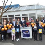 Dudley South MP Mike Wood with staff and students at Bromley Pensnett Primary School