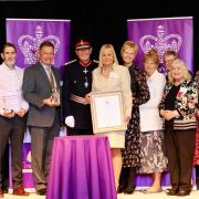 The team at the Edward Marsh Centre in Kinver receiving the King's Award for Voluntary Service