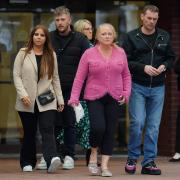 L-r - Jess Chatwin, Cody Fisher's girlfriend, Tracey Fisher, mother of Cody Fisher, and Christian Fisher, father of Cody Fisher, outside Birmingham Crown Court