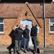 L-r - Mark Tuffin, Nilesh Patel, and Amit Sharma outside Pinder & Moore Opticians in Kingswinford