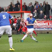 Glassboys striker Luke Benbow goes for goal against Mickleover. Photo: Andrew Roper