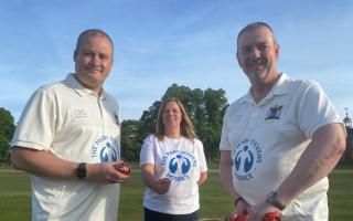Hospice captain Chris Bastable and Angie Bastable from Mary Stevens Hospice with Enville CC chairman Rob Miller