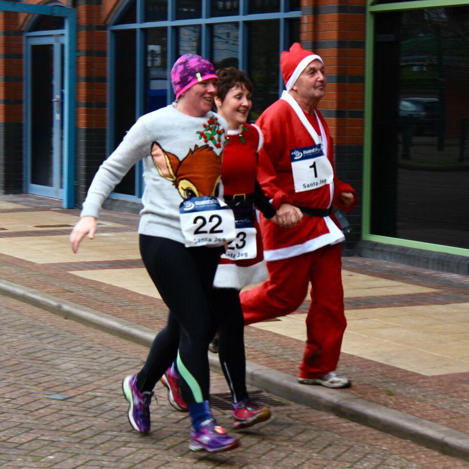 BRIERLEY Hill was awash with Santas and other festively-dressed runners when the town staged its first-ever Santa Jog at the weekend. 