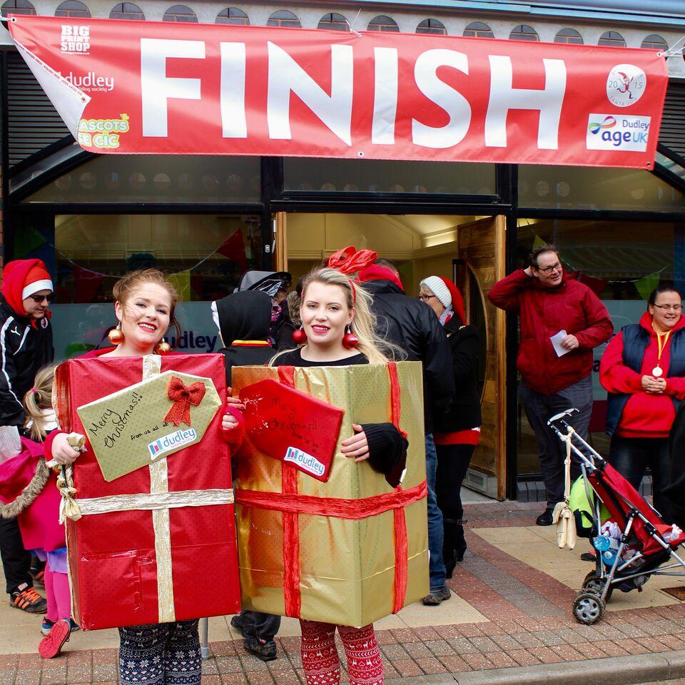 BRIERLEY Hill was awash with Santas and other festively-dressed runners when the town staged its first-ever Santa Jog at the weekend. 