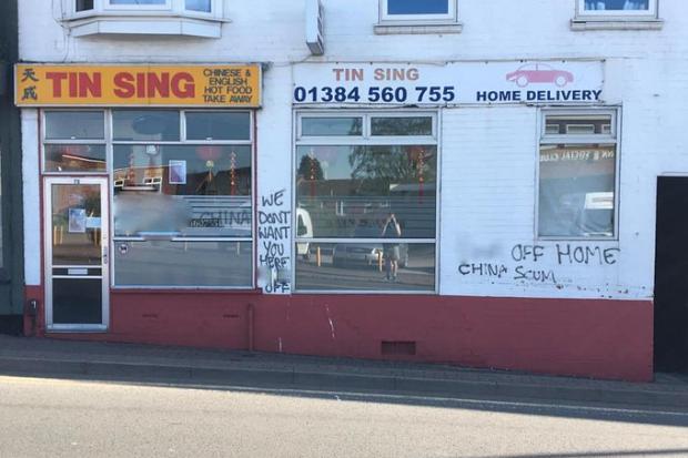 The graffiti covered Tin Sing takeaway in Quarry Bank High Street