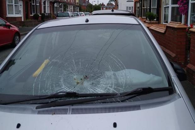 The vandal-smashed windscreen of the car parked in Clark Street in Stourbridge.