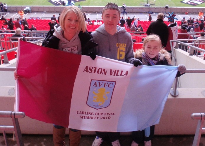 Brad with mum Kim and sister Rebecca supporting their beloved Villa