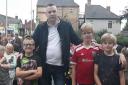 Lye trader Gary Farmer at the community gathering with Alfie, Liam and Nathan Jackson
