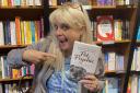 Beth Lee-Crowther with her book Everything You Need to Know to Become a Pet Psychic
