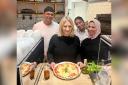 Stourbridge MP with Heba Mohammad, right, and her partner Ahmed Rabie, left, and their daughter Sama Rabie at Gusto Di Italia in Stourbridge High Street