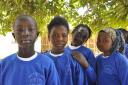Students in The Gambia wearing old Church of the Ascension Primary School uniforms which the school donated.