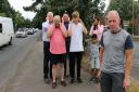 Hagley Road resident Mark Higgs, right, and his neighbours are fed up of the noise caused by cars driving over the road’s raised white speed camera lines