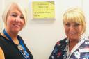Dudley Group chief executive Diane Wake with Linda Taylor from the children's ward unveiling the plaque in memory of Steve Ford