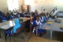 Children at Madiana Lower Basic School in The Gambia with the chairs and tables donated by Newfield Park Primary School