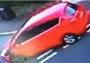 Police are searching for the driver of a red Ford Focus C-Max who injured children in a hit and run in Wollescote on Monday. Photo: West Midlands Police