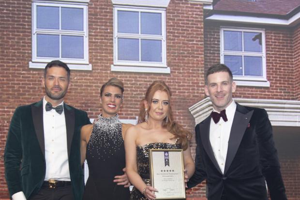 The Horgan Homes team celebrate their double whammy win at the UK Property Awards