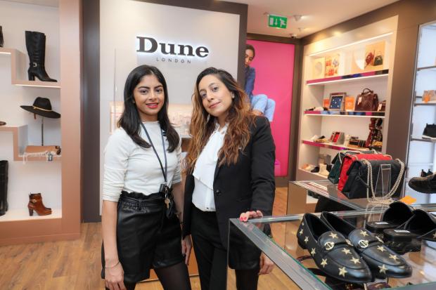 Store assistant Daveen Kaur and store manager Kiran Ayaz
