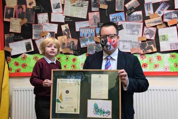 Mike Wood with Christmas card competition winner Harry Jones, Year 1, Dawley Brook Primary