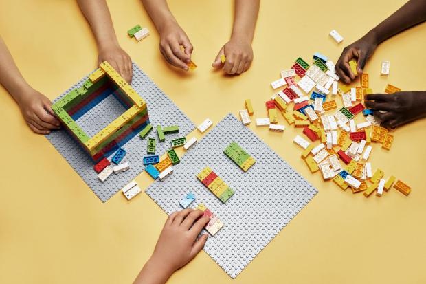 Stourbridge News: Children playing with LEGO. Credit: PA