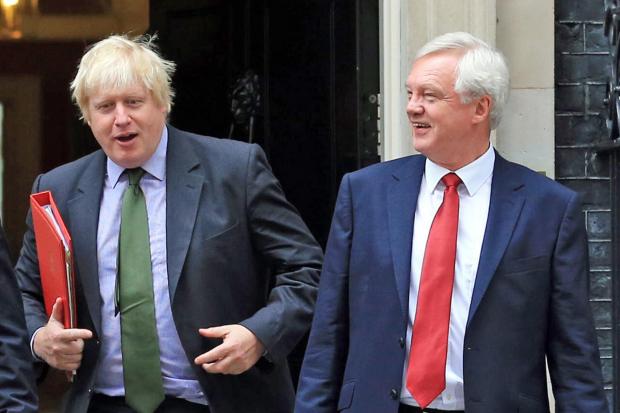 A picture of Boris Johnson (left) and David Davis back in 2016, when Johnson was Foreign Secretary (PA)