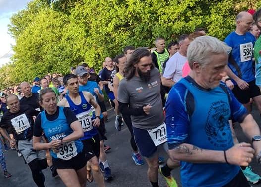 Stourbridge News: Runners turn out in force for the popular mid-week road race starting in Wall Heath