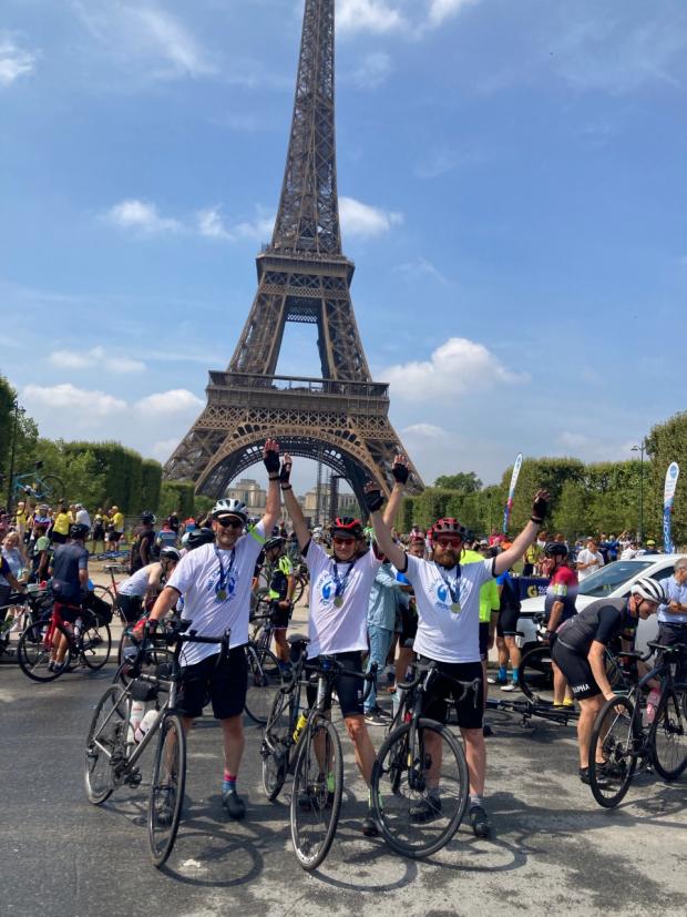Stourbridge News: At the Eiffel Tower - Cyclists Rob Griffin and Richard and Matt Carroll 