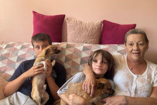 SHOCKED: L-R are Harry Davis, 10, Alicia Davis, eight, and their nan, Angela Tippon. Photo: James Connell