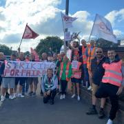Royal Mail workers on the picket line outside the Stourbridge sorting office, with CWU union rep Wayne Haywood, front centre. Pic - Bev Holder/Newsquest