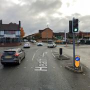 One traffic light column at the busy junction has been knocked down