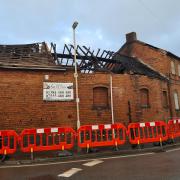 The fire damaged factory building on the corner of Crabbe Street and Careless Green