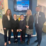 Education Secretary Gillian Keegan, left, with Stourbridge MP Suzanne Webb and headteacher Simon Duncan and year 6 pupils Isla and Josh, centre.