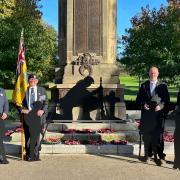 Cllr James Clinton, left, in Mary Stevens Park with some of the  soldier statues donated by Sentinel Plastics Ltd, with Dave Brenton who inspired the project, Steve Hill of Sentinel Plastics Ltd and Bob Partridge from Stourbridge Royal British Legion.