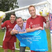 Ray Nash, of the Alzheimer's Society, with Higgs & Sons’ Joe Cowles and Richard Griffiths.
