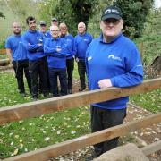 Team leader John Foale with members of the Stewponey Volunteer group in their newly created memorial garden