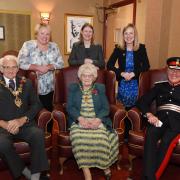 The Lord Lieutenant of the West Midlands, John Crabtree OBE, front right, with the Mayor and Mayoress of Dudley, Councillor Alan Taylor and his wife Winifred, with staff from Black Country Housing Group, back.