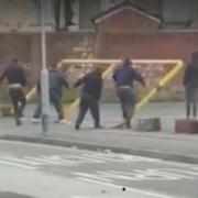 Captured on camera: a group of people were seen pushing over the car park barrier in Jackson Street, Lye, on Sunday January 27.