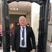 Headteacher Gareth Lloyd walking through the knife arch. Pic - Stourbridge Police